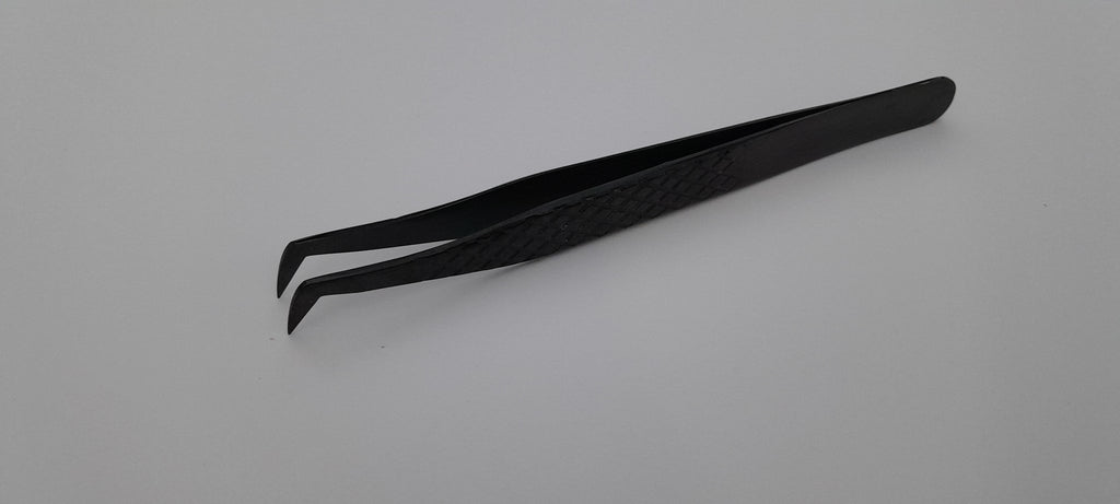 Plasma black boot tweezer with diamond grip, angled view