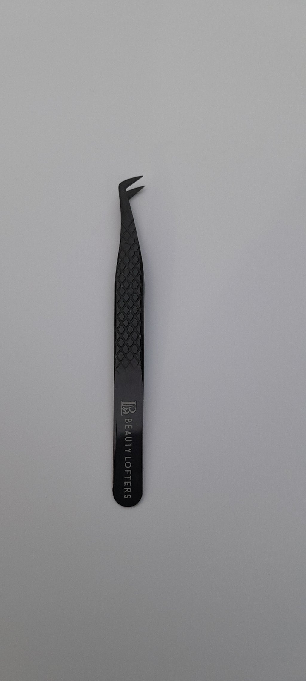 Diamond Grip Boot Tweezer in plasma black showing angled boot tip