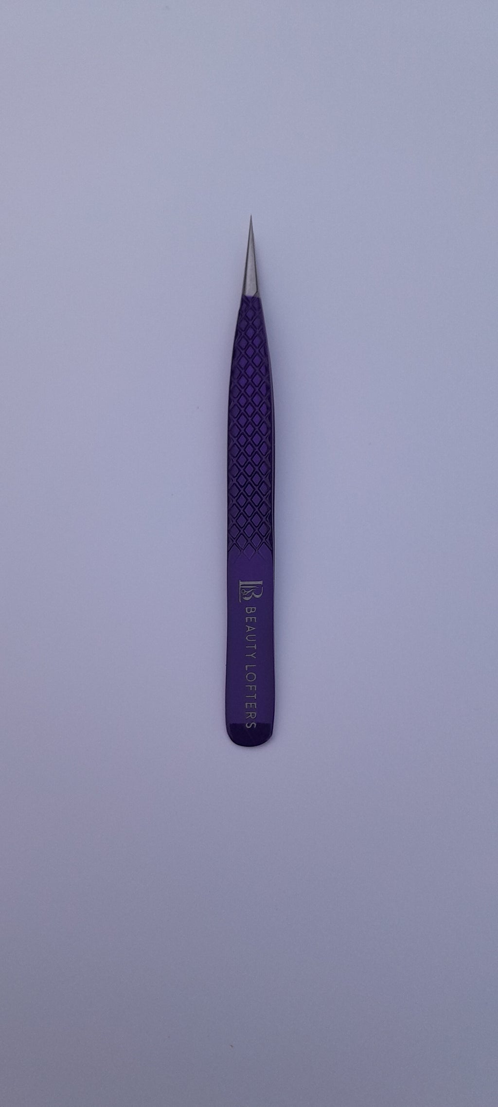 Full view of Beauty Lofters powder purple diamond print isolation tweezer
