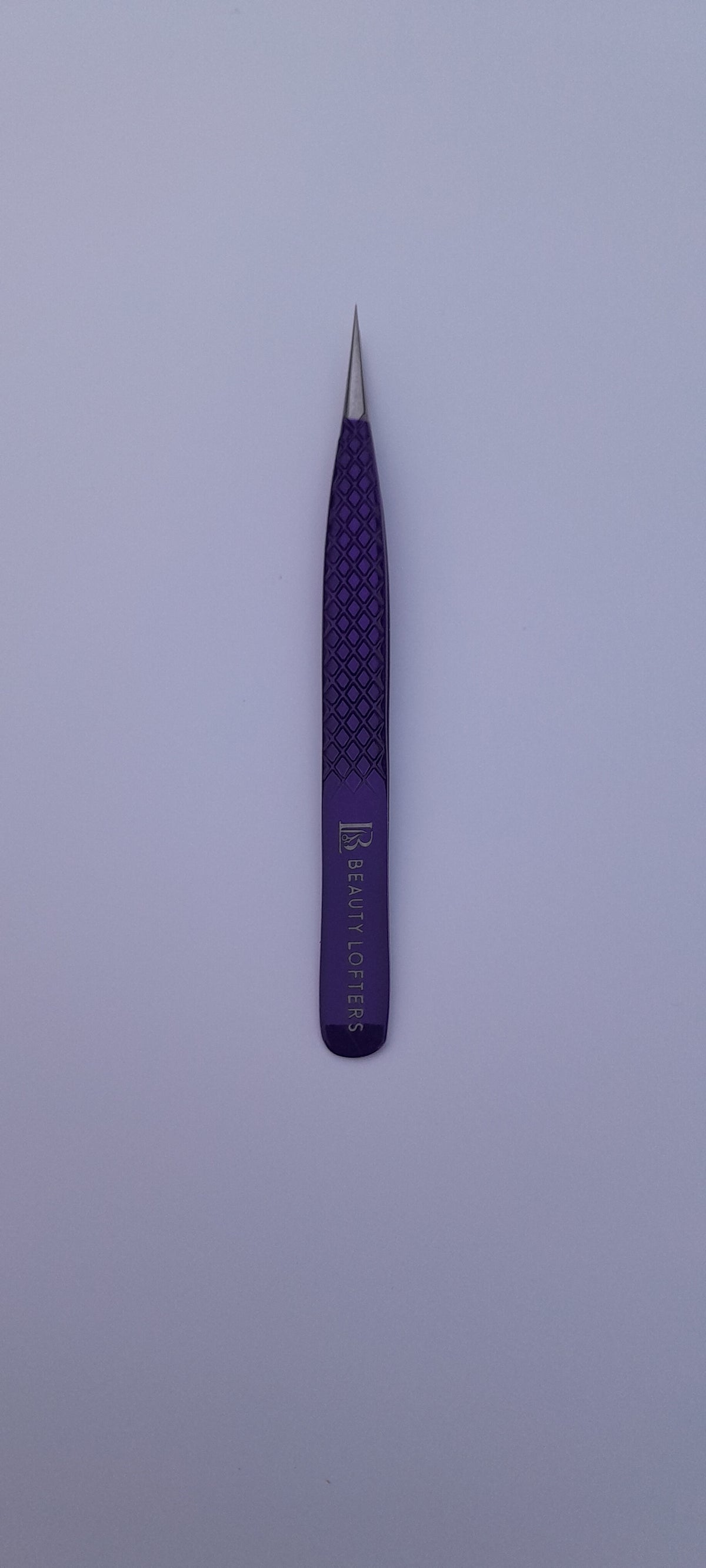 Full view of Beauty Lofters powder purple diamond print isolation tweezer